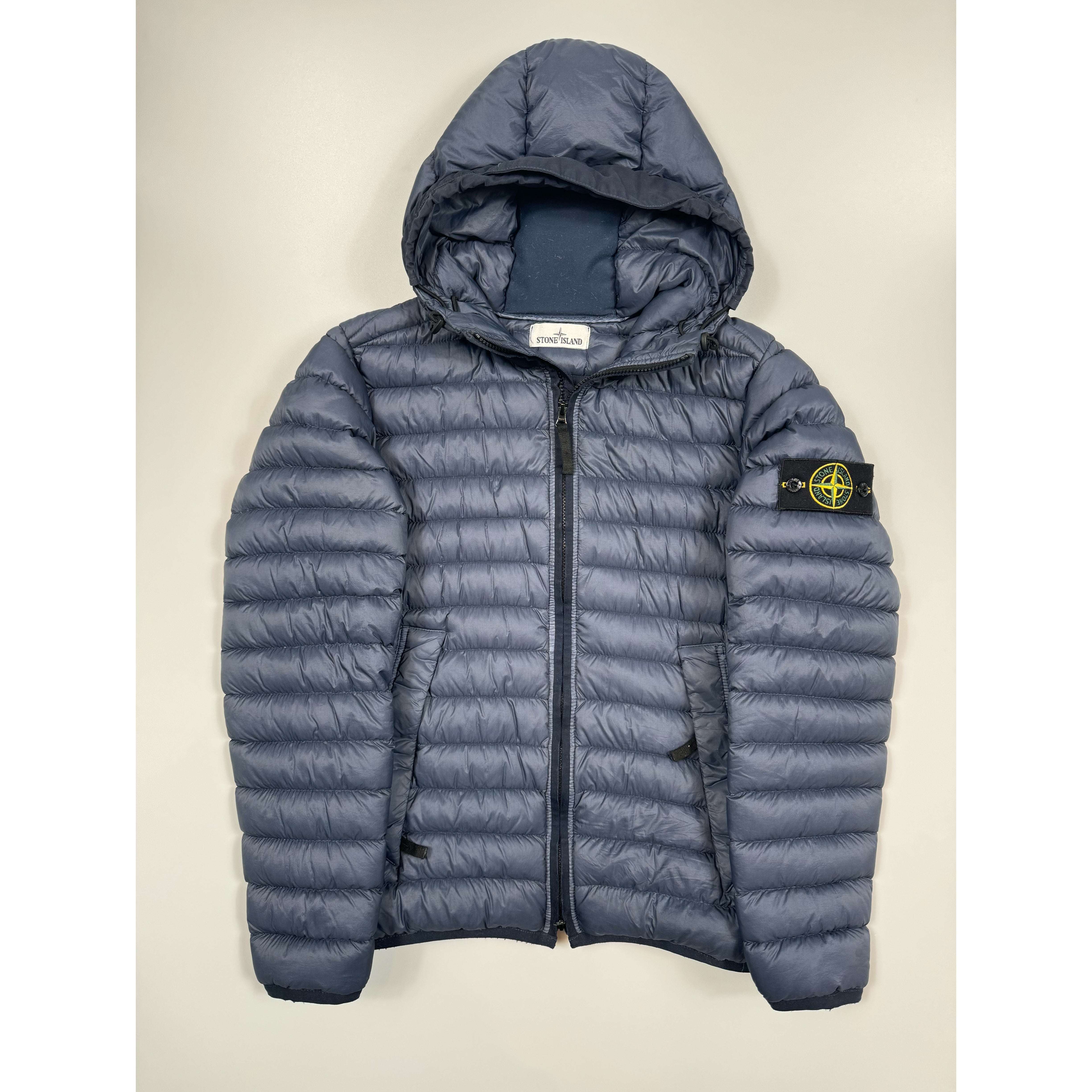 Stone island navy puffer jacket on sale